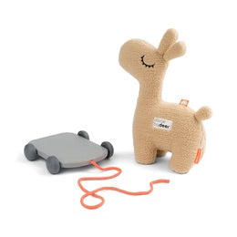 Done By Deer Pull Along 2-in-1 Toy featuring a soft giraffe and detachable wagon for toddlers.