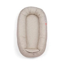 Cozy Nest in Sand color by Done By Deer, a luxurious and safe sleeping space for newborns. Perfect for play, rest, and tummy time.