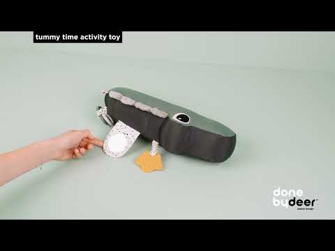 Tummy time activity toy Croco in sand color with sensory features for babies by Done By Deer.